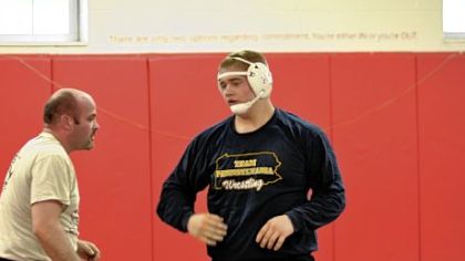 Jake Beistel, right, a freshman wrestler at Southmoreland High School, with his wrestling coach Ryan Shaw.