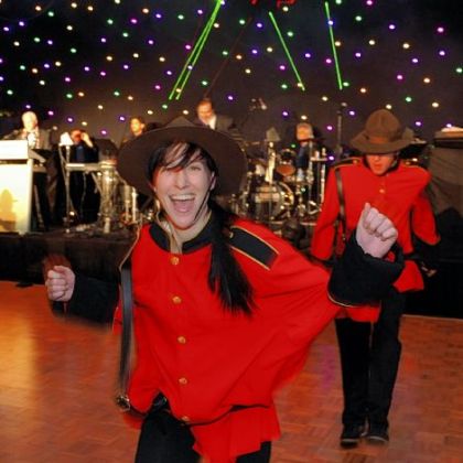 Mountie dancers entertain at the Epilepsy Foundation Mardi Gras