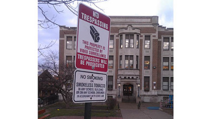Security signs greet visitors outside Bellevue Elementary School.