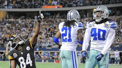 Steelers receiver Antonio Brown celebrates after scoring on a touchdown pass Sunday against the Dallas Cowboys.