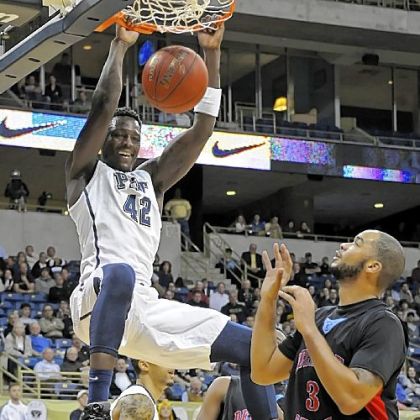 Pitt's Talib Zanna dunks for two of his game-high 20 points in the Panthers' rout of Delaware State Wednesday at Petersen Events Center.