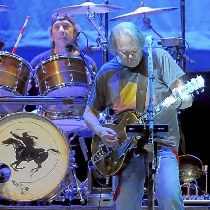 Neil Young performs with Crazy Horse at the Petersen Events Center.