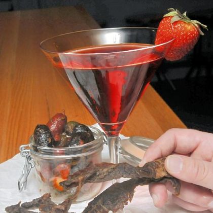 Beef jerky and marinated olives from the late-night menu at Up Modern Kitchen in Shadyside.