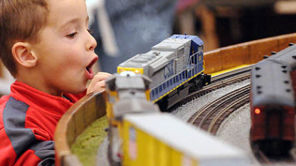 Matthew Wakefield, 4, of Monroeville watches the O-gauge train layout presented by the Pittsburgh Independent Hi-Railers club at Greenberg's Train & Toy Show at the Convention Center in Monroeville.