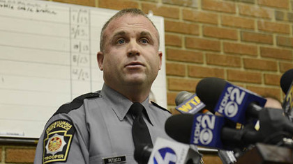 Pennsylvania State Trooper Jeff Petucci addresses the members of the media at a bews conference regarding a shooting Friday along Juniata Valley Road in Geeseytown, part of Frankstown Township in Blair County.