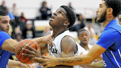 Gateway's Deon Baker, center, transferred from Imani Christian and is expected to have a big impact for the Gators this season.