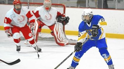 Hampton's Ethan Hornitz handles the puck against North Hills in November,
