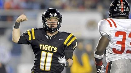 North Allegheny quarterback Mack Leftwich celebrates a touchdown against Coatesville in the PIAA class AAAA championship at Hersheypark Stadium Saturday.