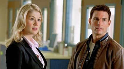 Rosamund Pike portrays a defense attorney and Tom Cruise is Reacher in "Jack Reacher."