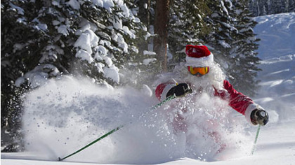 Gregory A. Gull Jr., dressed as Santa Claus, skis on Thursday in fresh snow in Crested Butte, Colo. Light snow began falling this morning in Pittsburgh on the first day of winter.