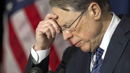 National Rifle Association executive vice president Wayne LaPierre speaks in Washington Friday on the one-week anniversary of the Sandy Hook Elementary School shootings in Newtown, Conn. The United States' most powerful pro-gun lobbying group, the NRA, called Friday for armed police or security guards to be deployed to every school in the country.