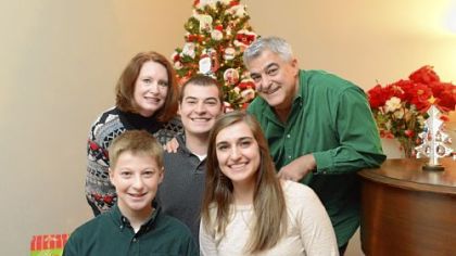 The Albanese family, from left, Barb, 49, Luciano, 12, Lorenzo, 20, Giovanna, 17, and Dave, 53, at their home in New Brighton. Dave Albanese, who spends most of the year teaching in Doha, Qatar, returns to Pittsburgh each year for a special Christmas breakfast.