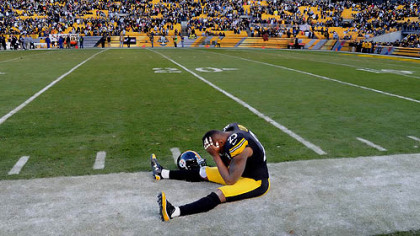 Ryan Clark sits on the sidelines in the final second of the fourth quarter of Sunday's loss to the Bengals.
