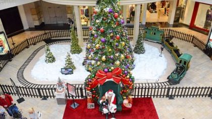 Brianna Zwick, 4, of Ross, tells Santa Ron what she wants for Christmas.