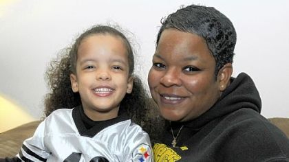 Anice Whatley, here with her daughter Olivia, 3, was born on Dec. 23, 1972, the day of the Steelers' playoff win against the Oakland Raiders and Franco Harris' Immaculate Reception.
