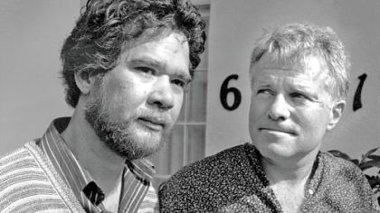 Richard Adams, left, and Anthony Sullivan appear at a news conference on May 10, 1984. They were facing the deportation of Mr. Sullivan to Australia. Mr. Adams, who used both the altar and the courtroom to help begin the push for gay marriage four decades before it reached the center of the national consciousness, died last Monday.