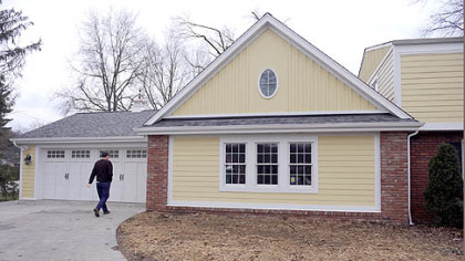 The Alexanders took down their garage and added a new first floor master suite at their house in O'Hara.