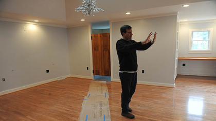 Neil Alexander gives a tour of the new first floor master suite he and his wife Suzanne built to be more accessible as Neil's ALS progresses/