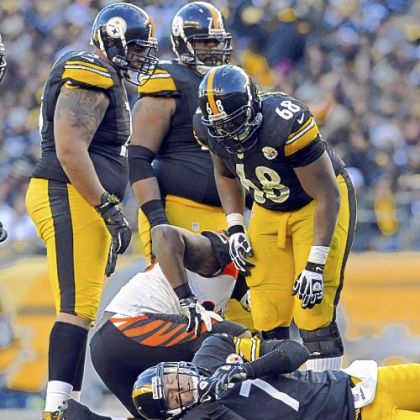 Steelers quarterback Ben Roethlisberger is slow to get up after getting hit by the Bengals in the fourth quarter Sunday at Heinz Field.