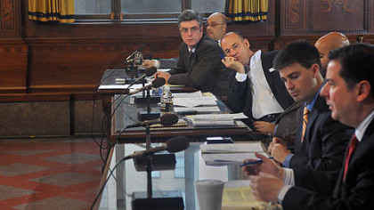 Members of Pittsburgh City Council listen to council member Bill Peduto talk about postponing parking meter enforcement  at night until summer 2013.  The measure passed with only Patrick Dowd abstaining.  (L-R) Dowd, Rev. Ricky Burgess, Bruce Kraus Corey O'Connor, R. Daniel Lavelle, Peduto.