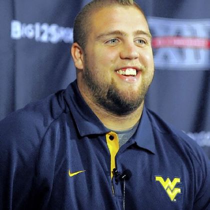 West Virginia center Joe Madsen will miss the Pinstripe Bowl after being declared academically ineligible.