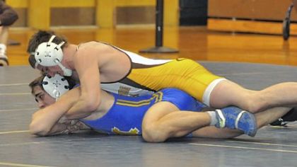 Greensburg Salem's Zach Voytek, on top of Canon-McMillan's Dario Dobbin during last season's WPIAL team tournament, will compete at the Powerade tournament.
