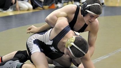 North Allegheny's Dom Forys puts an arm lock on Kiski Area's Ryan Hardaway during 120-pound match at Eastern Invitational tournament earlier this month. Forys won the match by major decision, 14-5.