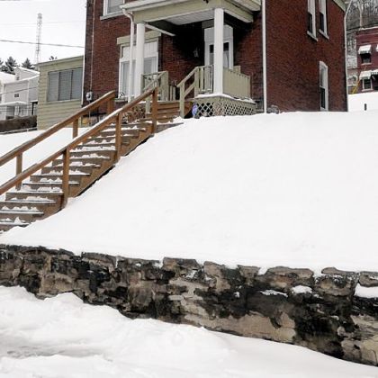 The exterior view of the house, which is on the market for $68,900 through Howard Hanna Realty.