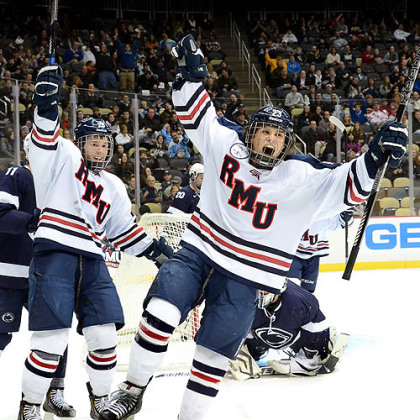 Robert Morris' Cody Wydo celebrates after scoring in the first period Friday against Penn State in the Three Rivers Classic at Consol Energy Center.