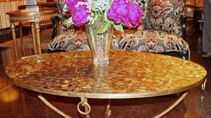 Clairval coffee table by French Heritage in 
a gold leaf finish with gold shard glass top.