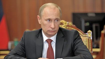 Russia's President Vladimir Putin looks on in a meeting Friday at the Kremlin in Moscow.