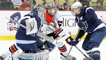 Penn State's Matthew Skoff makes a save on Ohio State's Darik Angeli in the first period Saturday at Consol Energy Center.