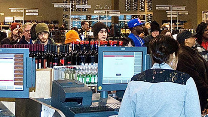Large crowds get in last minute shopping at the Pennsylvania Wine and Spirits Premium Collection Store, Shadyide Monday afternoon.