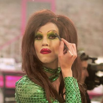 Aaron Coady as Sharon Needles.