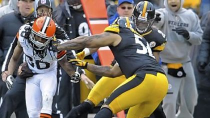 Steelers cornerback Cortez Allen forces a fumble against the Browns' Travis Benjamin in the fourth quarter Sunday at Heinz Field.