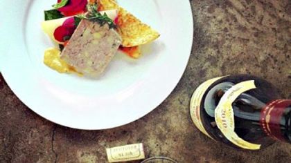 A bottle of Beaujolais from Bar Marco, which serves it by the glass with a small plate for $10.