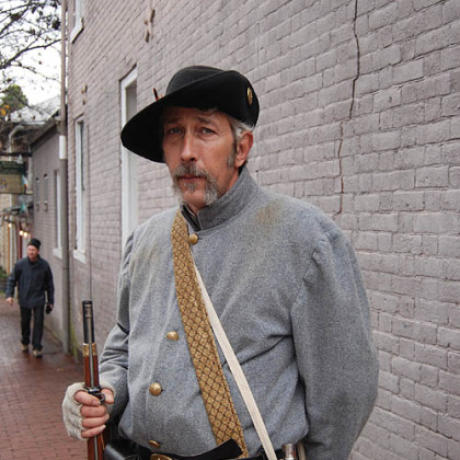 Jimmy Fowler of Fredericksburg has been a Civil War re-enactor for three years. He was standing guard on Hanover Street during street fighting at the 150th anniversary of the Battle of Fredericksburg.